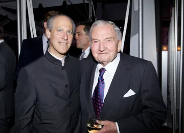 Lowry with David Rockefeller in 2009.
