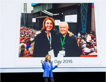 Ruth Porat in front of a photo of her with her father, Dan Porat, who died in 2019 at 96. In 2015 she brought him to the Google offices on family day.